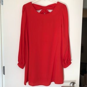 Red Asos long sleeve mini dress with bow back